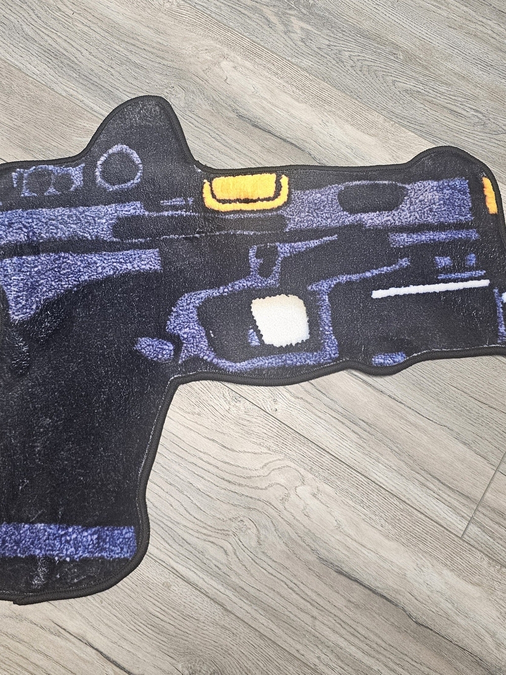 Glock 19-Shaped Rug in Black, Blue, Yellow